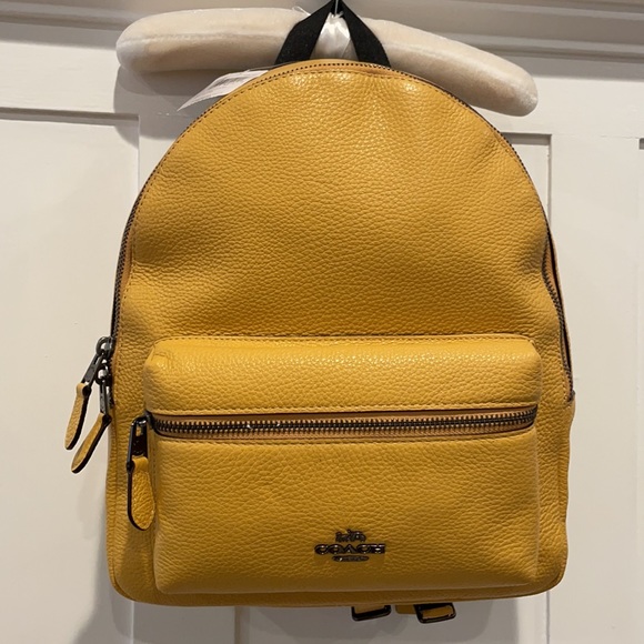 Coach Handbags - NWT Authentic Coach Pebbled Leather Medium Charlie Backpack in “Honey”